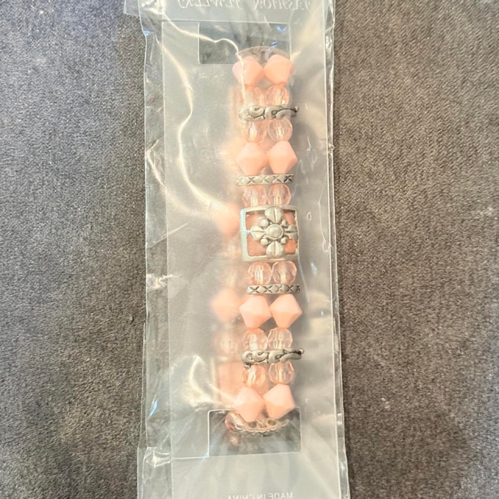 Brand New Pink floral beaded stretchy bracelet with silver accents